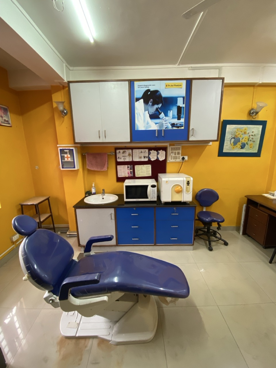 Dental operatory with chair and attached instruments