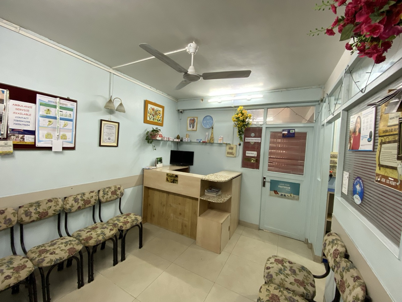 Reception room with waiting chairs and desk