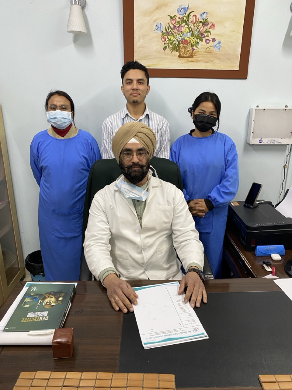 Group photo of Dr. Singh's Specialised Dental Centre team