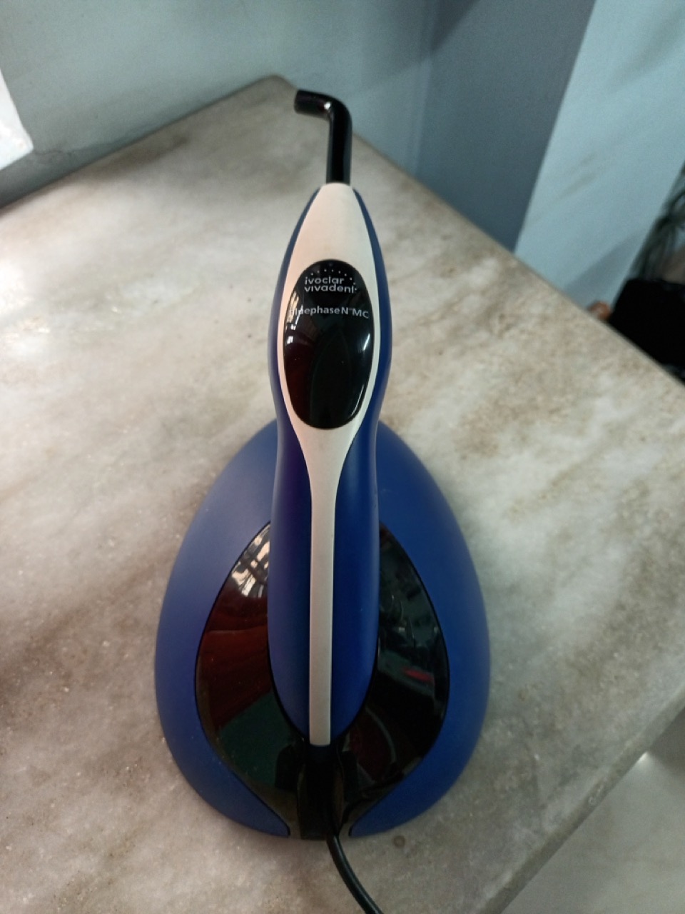 Close-up of dental composite curing light tool