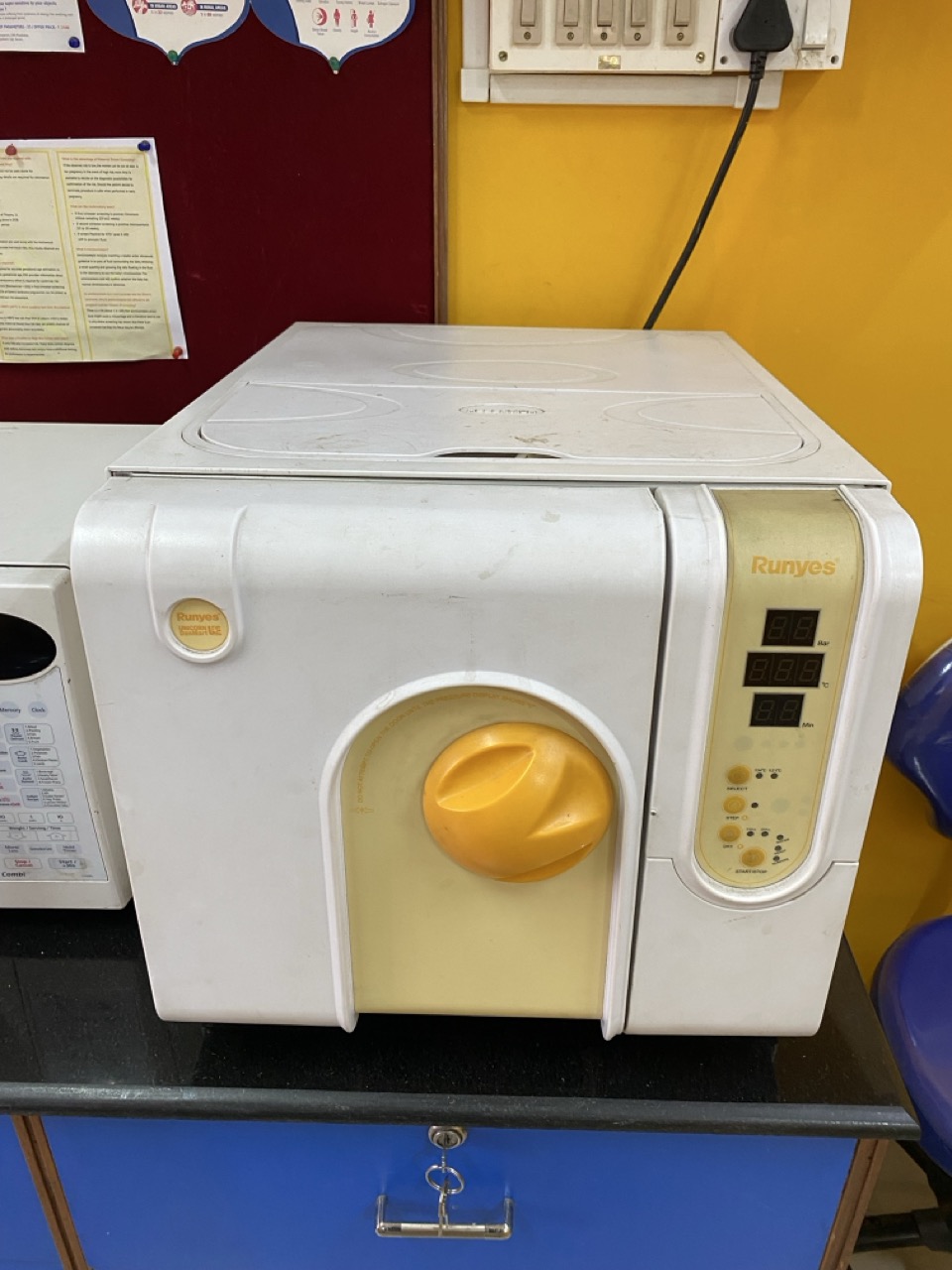 Utility counter with microwave and instruments