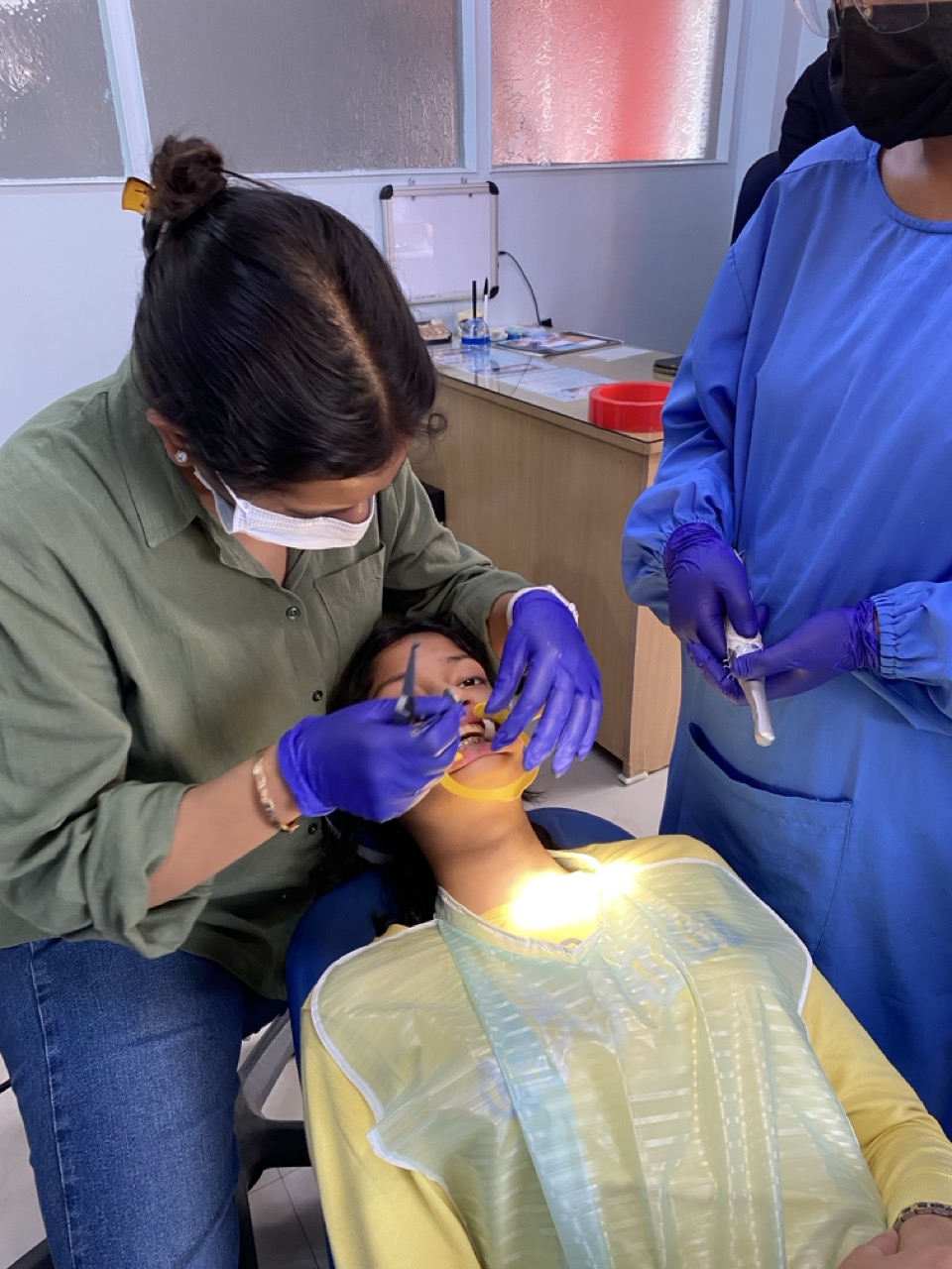 Close-up of dental treatment in progress